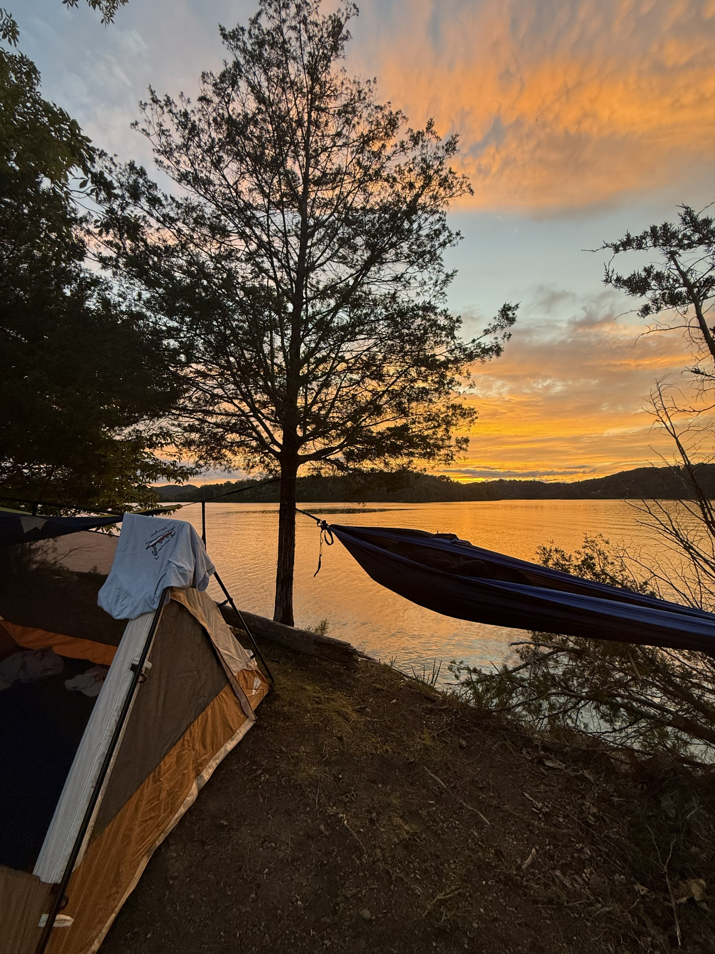 Lakeside camping at sunset